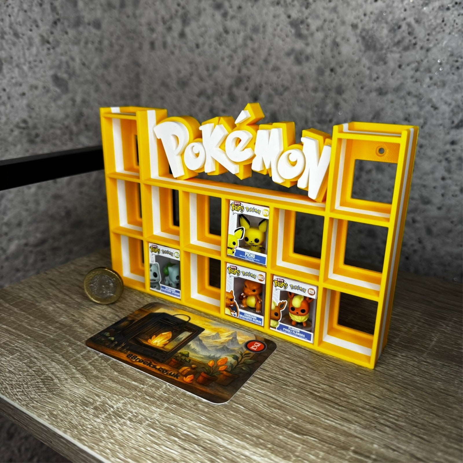 Display Shelf for Bitty Pop Pokemon themed yellow white 16 slots unit