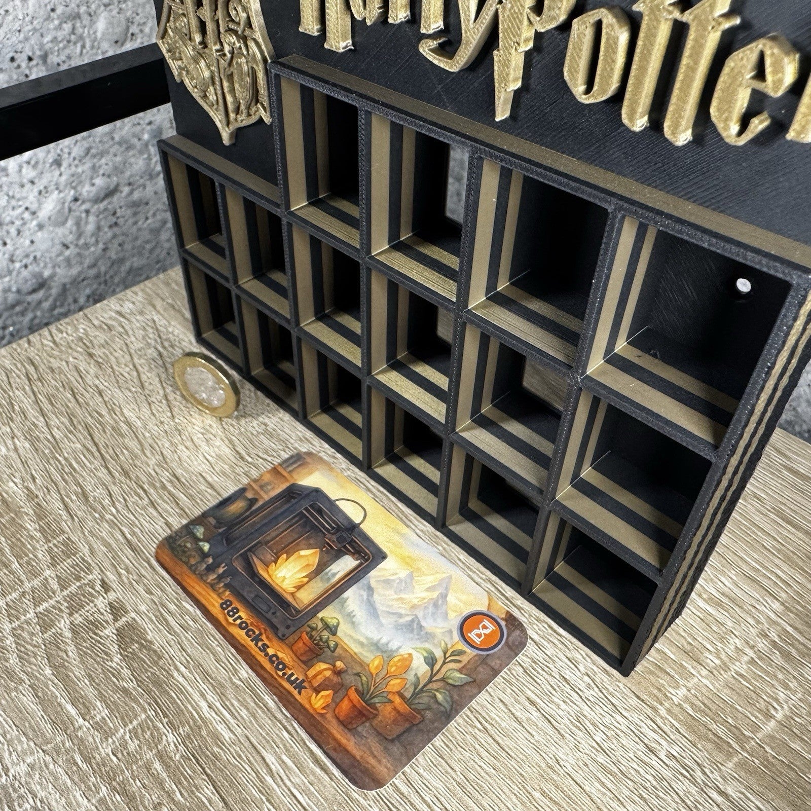 Display Shelf Organizer for 16 Bitty Pop boxes Harry Potter themed.