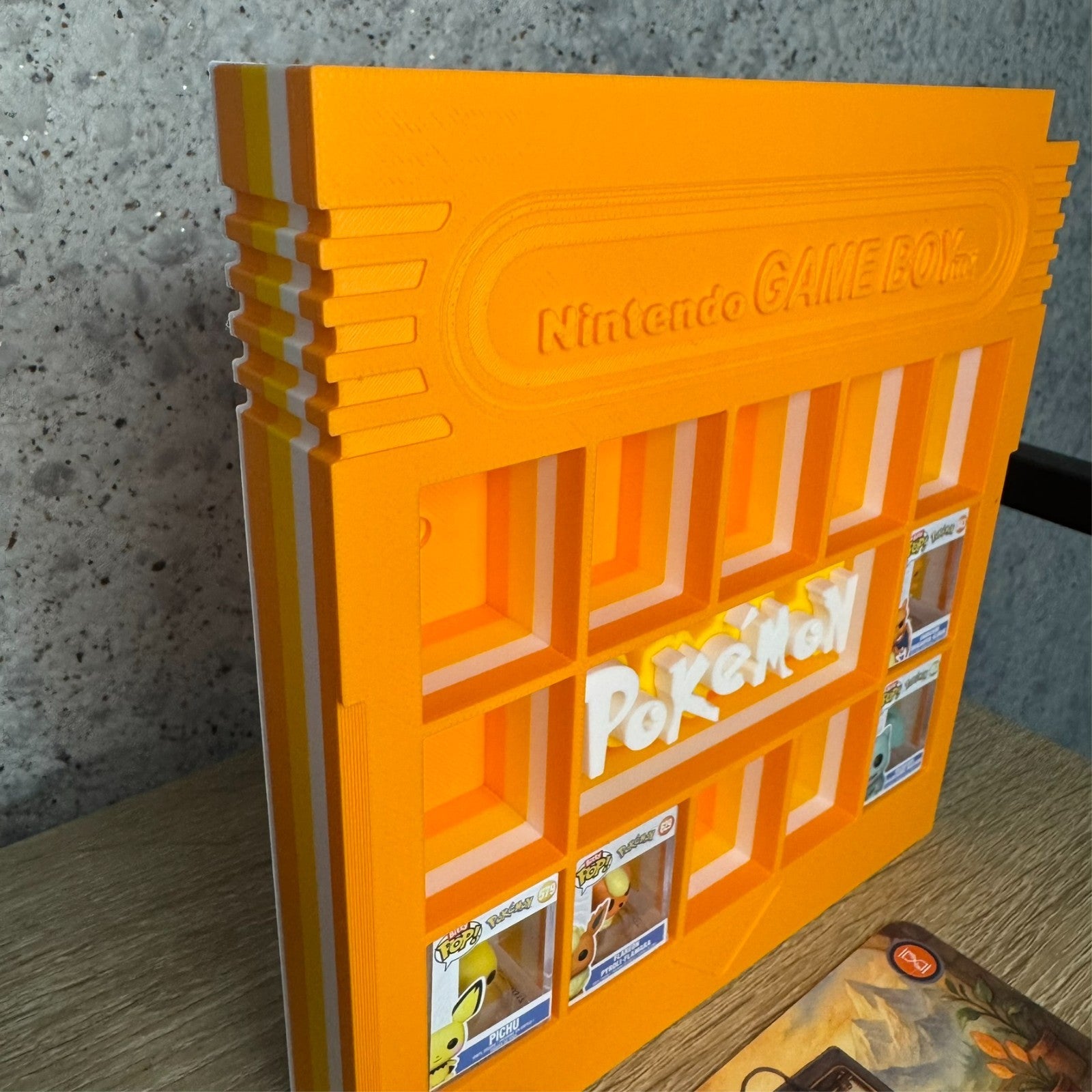 Display Shelf Organizer for 12 Bitty Pop boxes Game Boy Pokemon themed